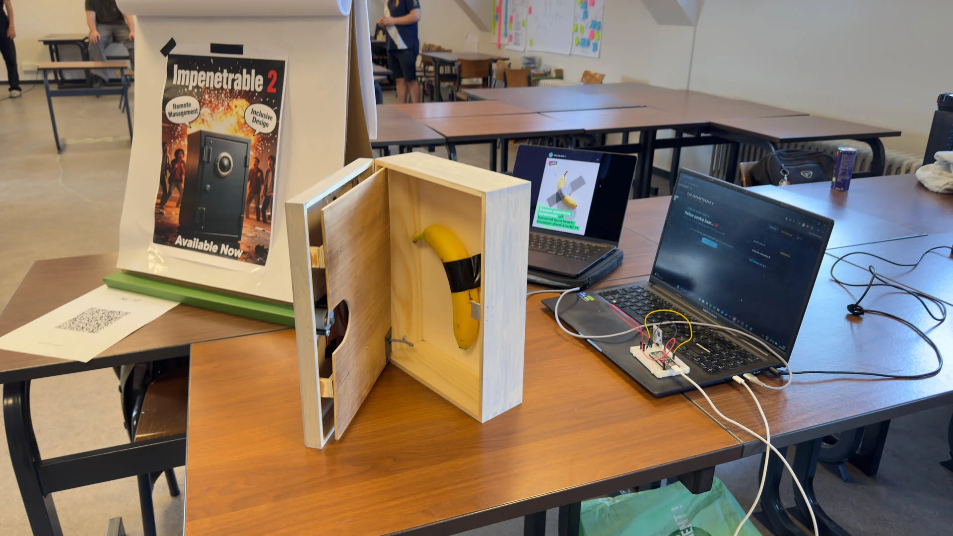 Demo setup with opened vault, ESP32 electronics and web application.